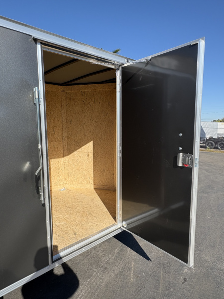 New 2026 Covered Wagon Trailers 6X12 SA CHARCOAL WITH RAMP Cargo / Enclosed Trailer