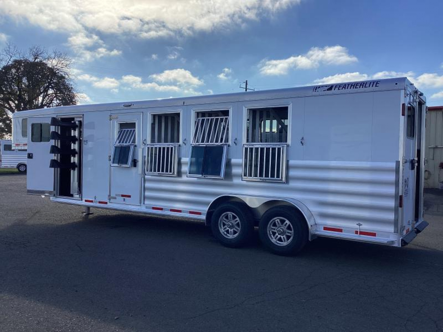 New RED $3300! 2024 Featherlite 9600-7472 4 Horse Trailer-Swing Out Saddle Rack-Stud Divider-Screen Door-Easy Care Flooring
