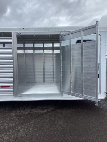 New PRICE REDUCED $3,600 2025 Featherlite 8413 24' Perfectfit Stock Combo Trailer-Escape Door Center & rear gates w/sliders-7'T-7'W