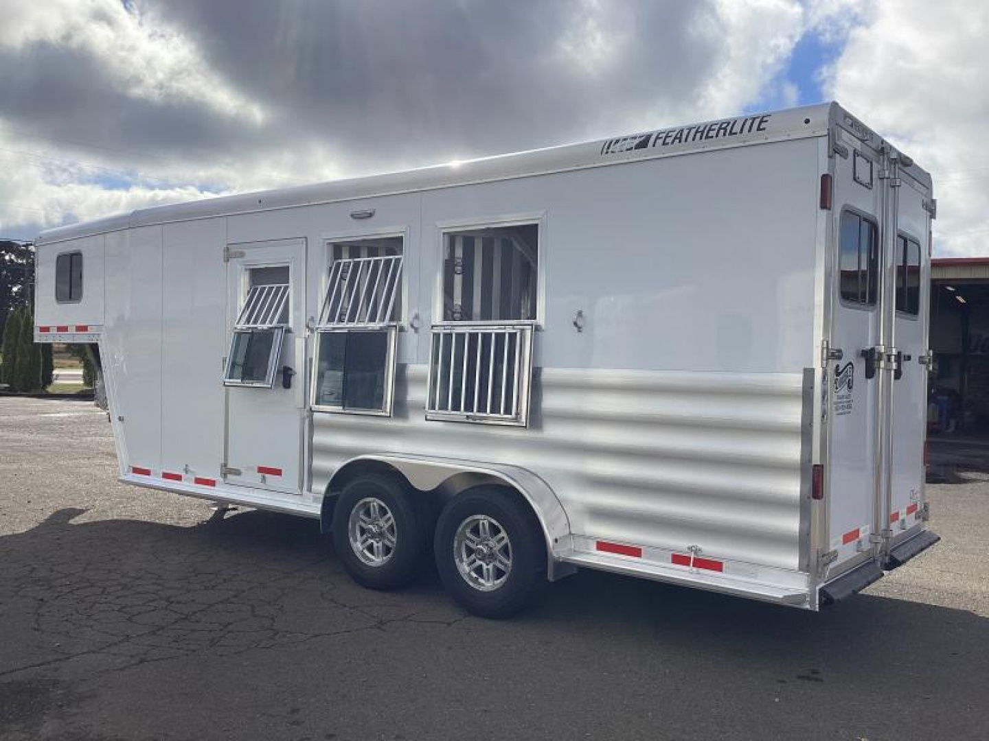 New REDUCED $2100! 2025 Featherlite PREMIERE TACK. Loaded! 7'6" Tall. HUGE SIDE TACK. INSULATED DRESSING ROOM. LOADED!