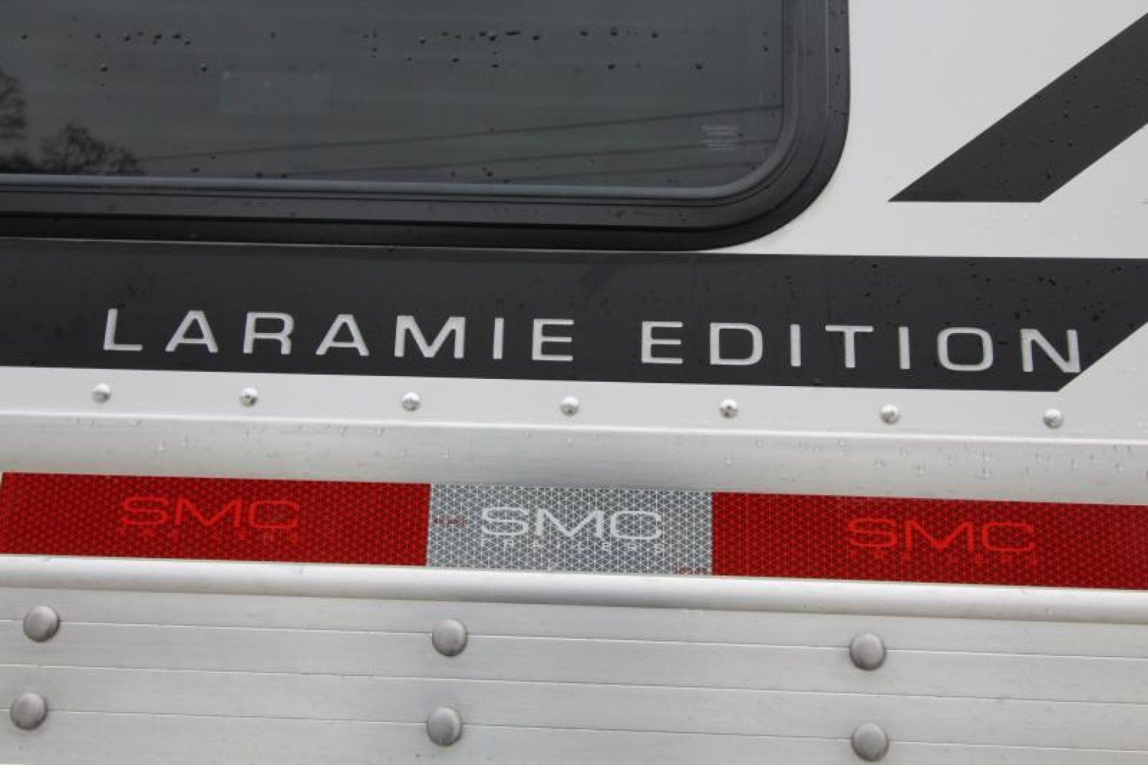 New PRICE REDUCED $10,000! 2025 SMC Laramie 8413SSR - Fully Loaded!!! Keyless Entry-Solar Panel-Hay pod W/Platform & Much More!!