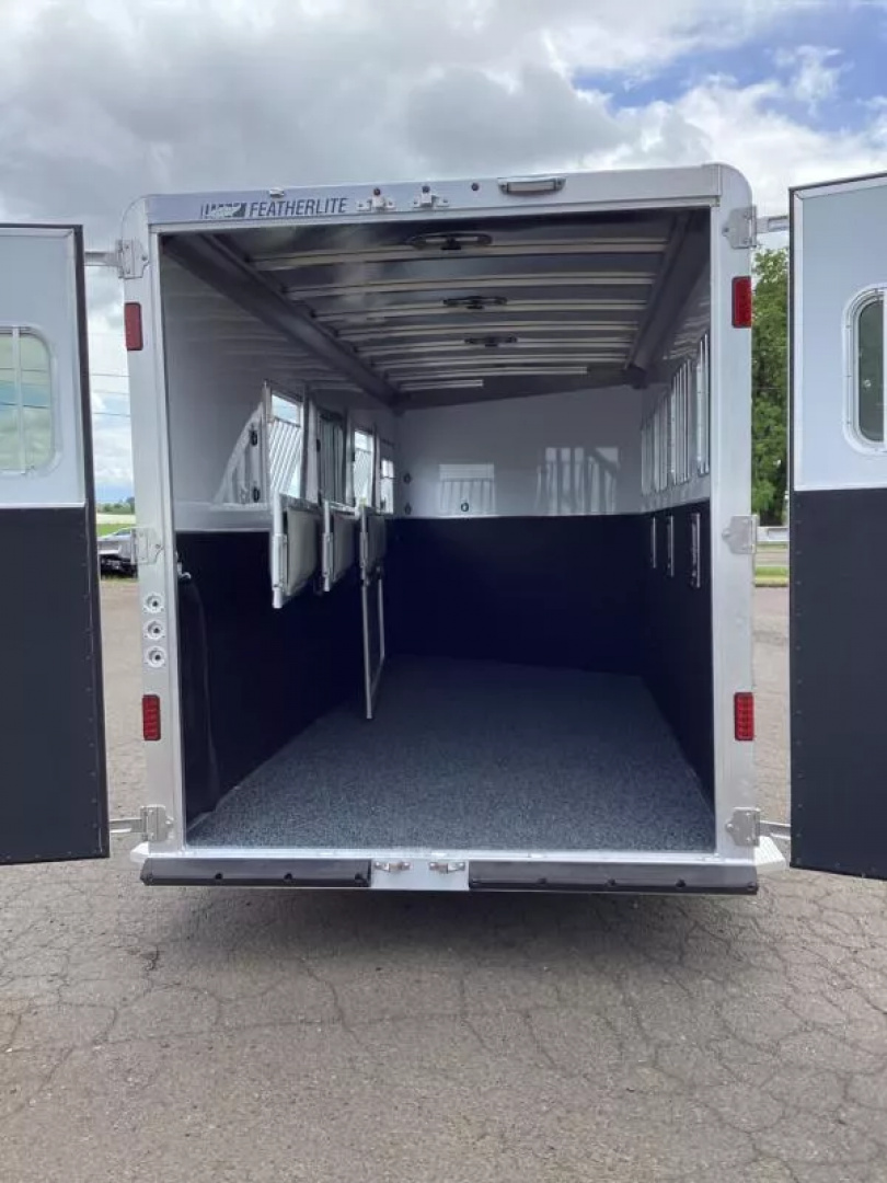 New 2025 Featherlite 9400 4 Horse -Premier Tack-7'6" Tall-Easy Care Flooring-Lined & Insulated Dressing/Tack Room Ceiling-Stud Divider-Escape Door