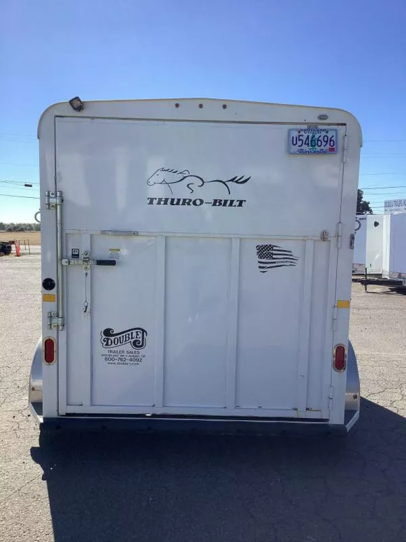 Used 2019 Thuro-Bilt Wrangler 2 Horse Trailer-Telescoping Padded Dividers-Swing-Out Saddle Tree- Spare Tire- Extra Divider Catch Horse Trailer