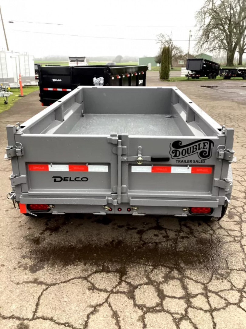 New 2026 Delco Dump Trailer 5x10 7K - Spreader gate - Jet Grey - 18" sides - slide in ramps Dump Trailer