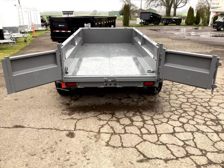 New 2026 Delco Dump Trailer 5x10 7K - Spreader gate - Jet Grey - 18" sides - slide in ramps Dump Trailer