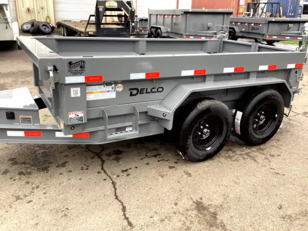 New 2026 Delco Dump Trailer 5x10 7K - Spreader gate - Jet Grey - 18" sides - slide in ramps Dump Trailer