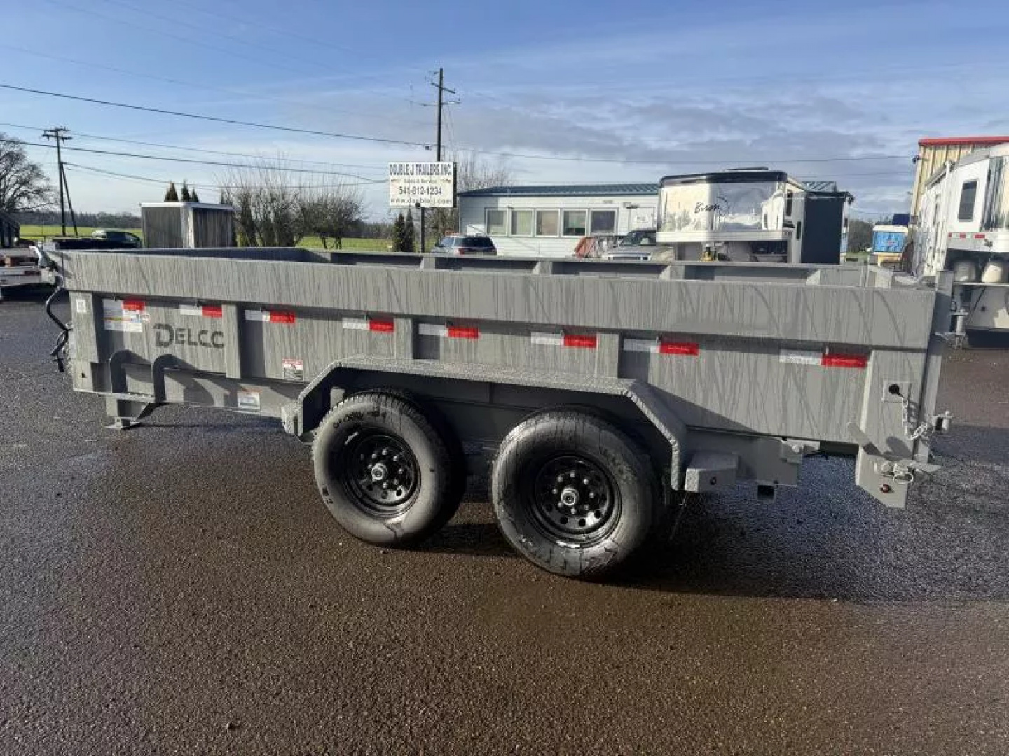 New 2026 Delco Dump Trailer 7x14 -14K - Spreader gate - Jet gray- 2' sides, 6' slide in ramps