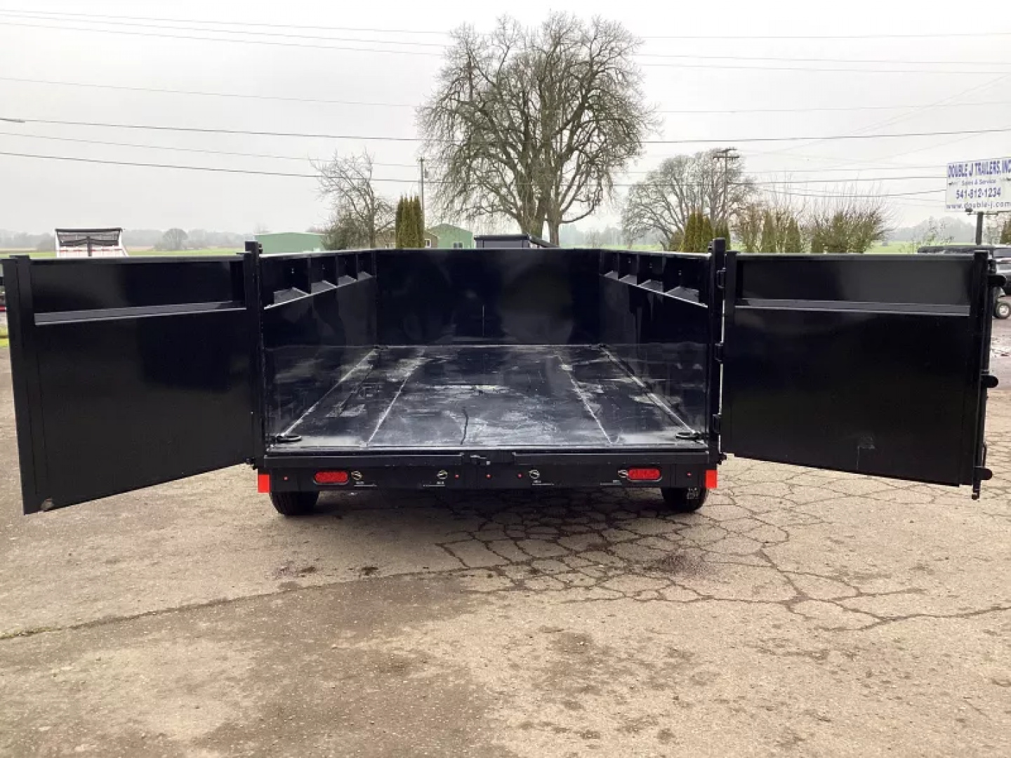 New 2026 Delco Dump Trailer 7x14 -14K - Spreader gate - 3' sides, 6' slide in ramps