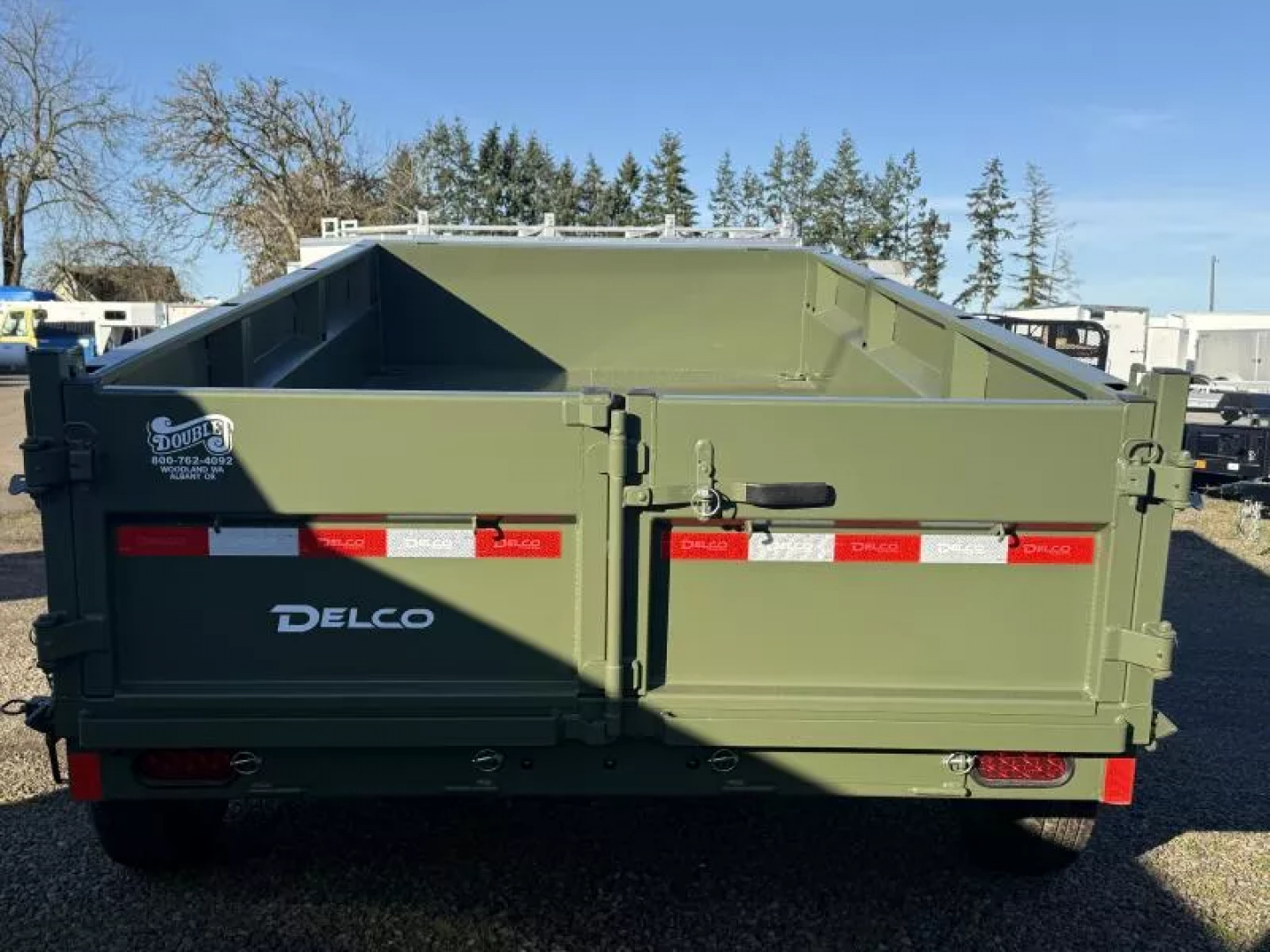 New 6x12 Dump Trailer-12K GVWR- 6" I-Beam, Spreader Gate-21'' sides, 6' Slide-in Ramps, Pull Back Tarp System, 10 Ply Tires, 4 D-rings
