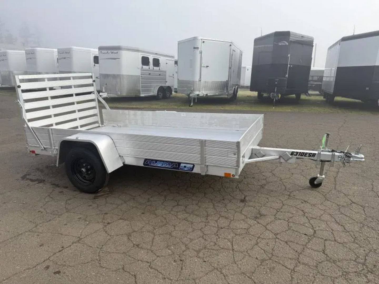 New 2026 Aluma 63" X 10' Aluminum Deck-12" solid front and sides, U-bolt spare tire mount, strt tailgate, 13" steel wheels