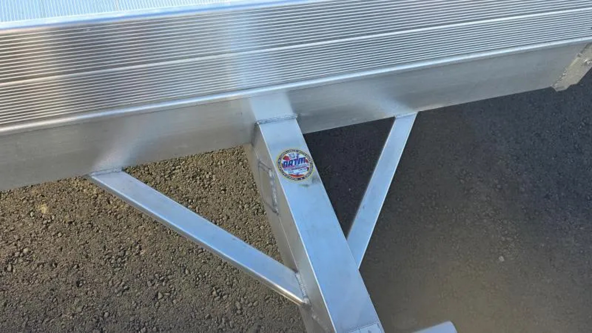 New 2026 Aluma 63" X 10' Aluminum Deck-12" Solid Front and Sides, U-bolt Spare Tire Mount, Strt Tailgate, 13" Steel Wheels Utility Trailer