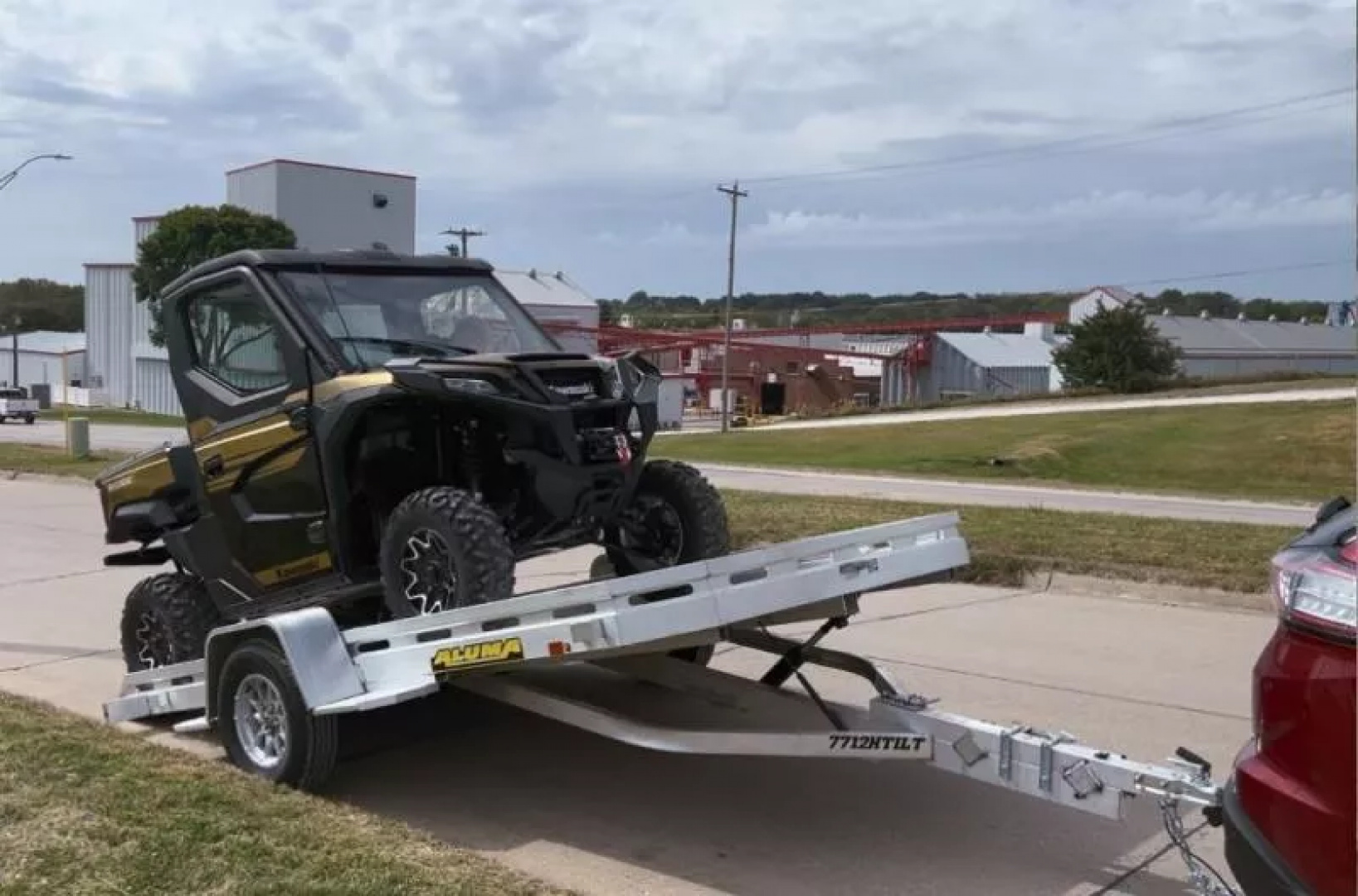 New 2027 Aluma 77x12' Heavy Tilt, 8.5" Front & Side Retaining Rails, 14" Silver Alum Tires Tilt Trailer