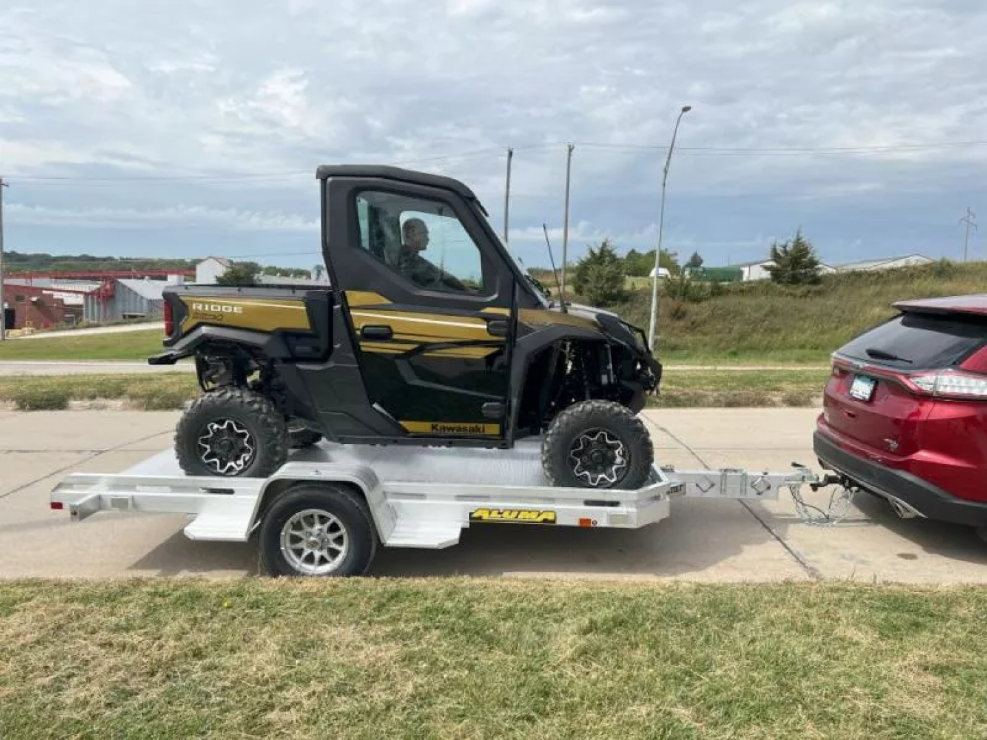 New 2027 Aluma 77x12' Heavy Tilt, 8.5" Front & Side Retaining Rails, 14" Silver Alum Tires Tilt Trailer