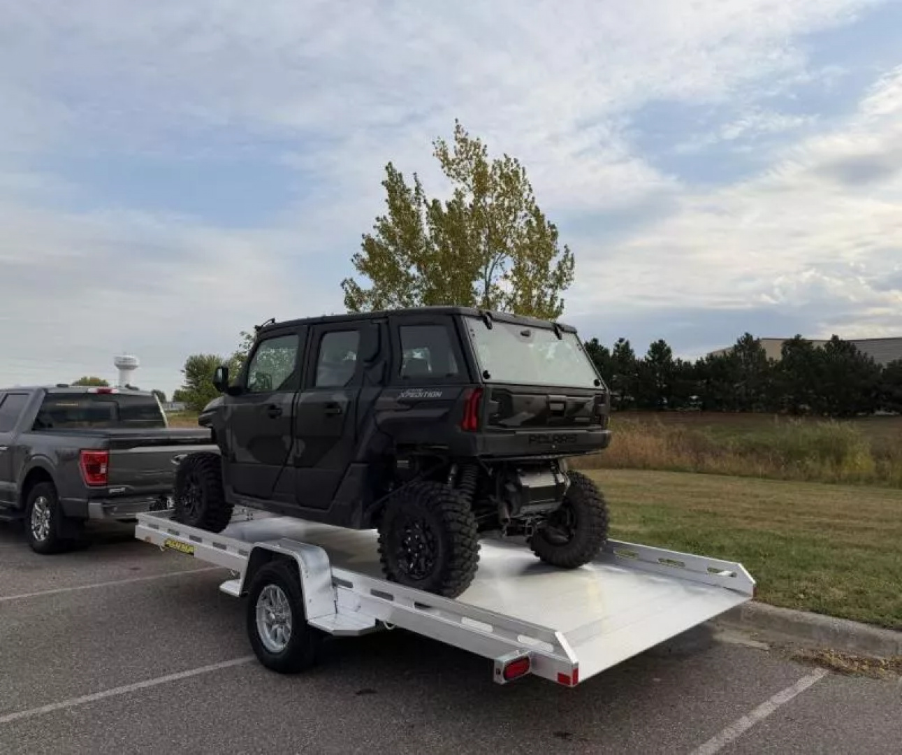 New 2026 Aluma 80x15' Single Axle Slotted Side Frame, Electric Brakes, Spare Tire Carrier, 15" Silver Alum Tires
