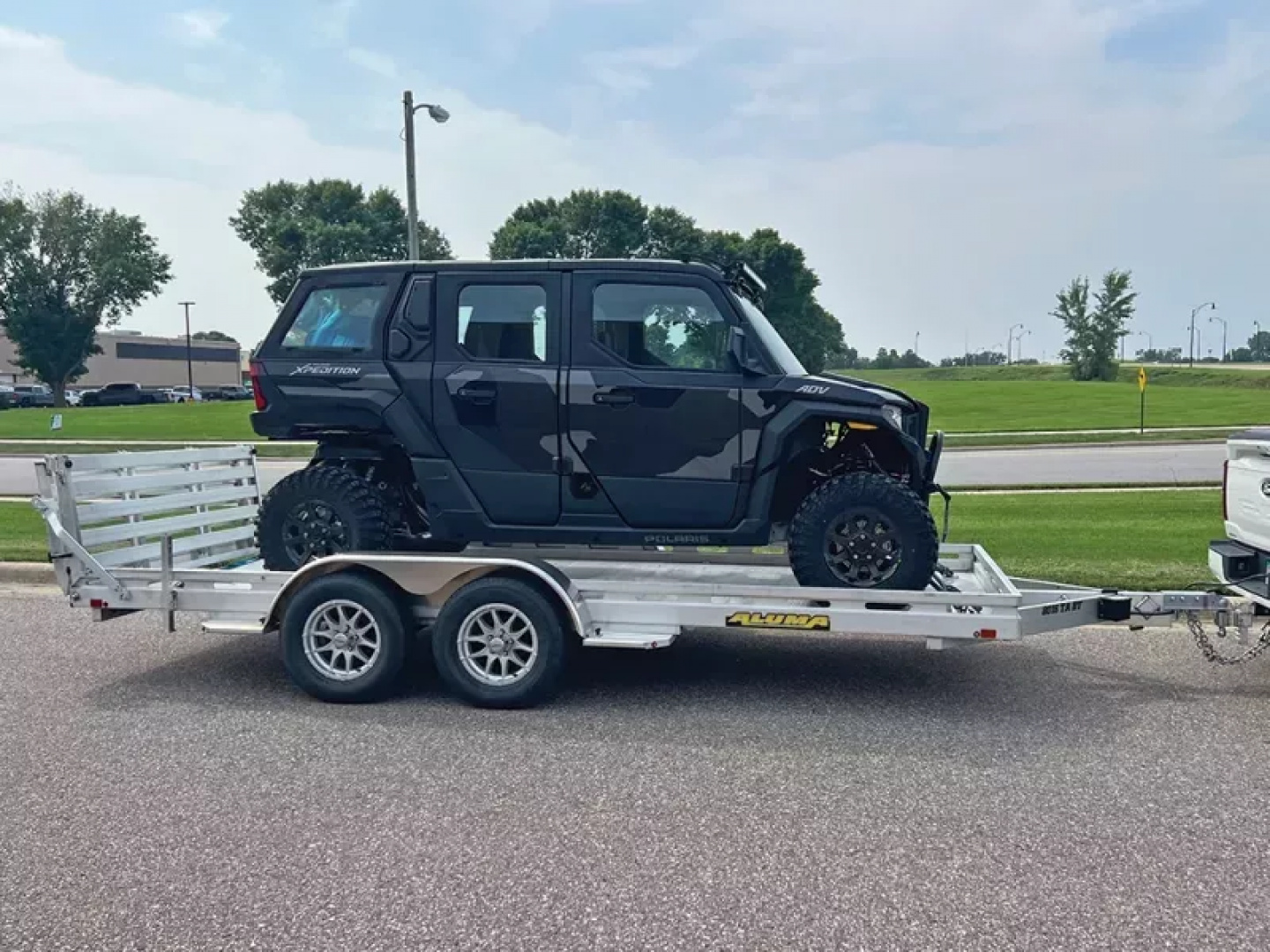 New 2027 Aluma 80x14' Tandem Axle, Bi-Fold Tailgate Slotted Rail, Electric Brake, Spare Tire, 15" Silver Alum Tires