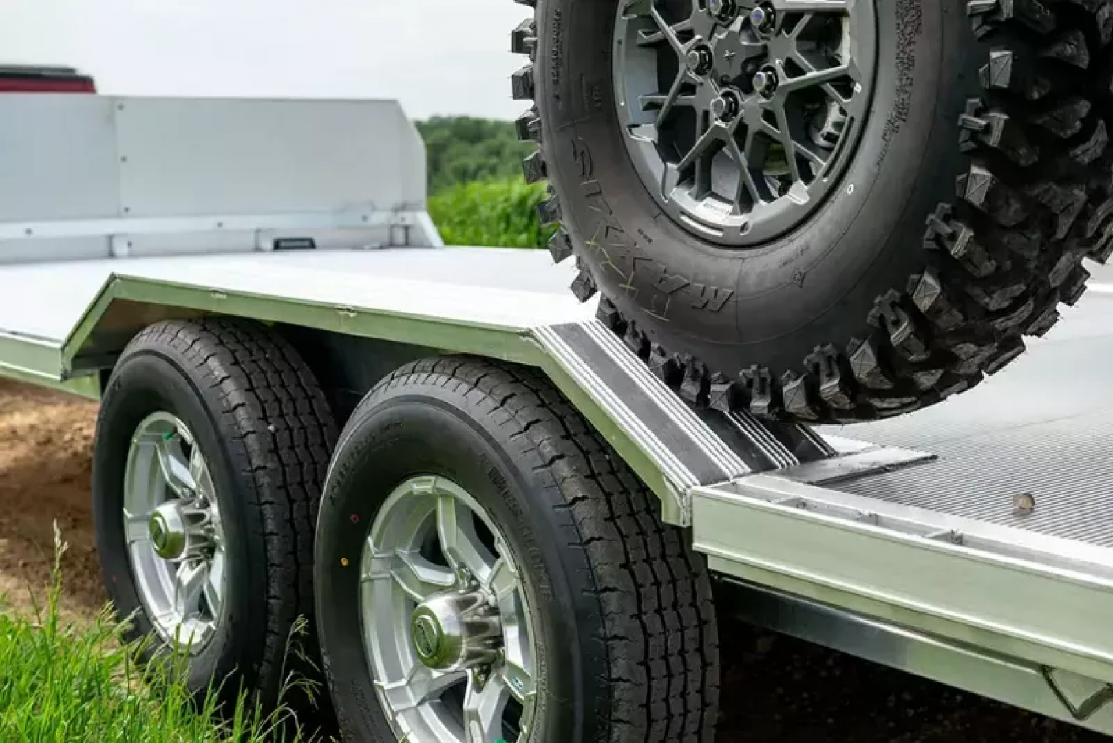 New 2027 Aluma Wide Body 18' Heavy Tandem Axle, Electric Brakes, Drive-On Fender Ramp, Front Rail, 15" Alum Wheels, Spare Tire Pkg