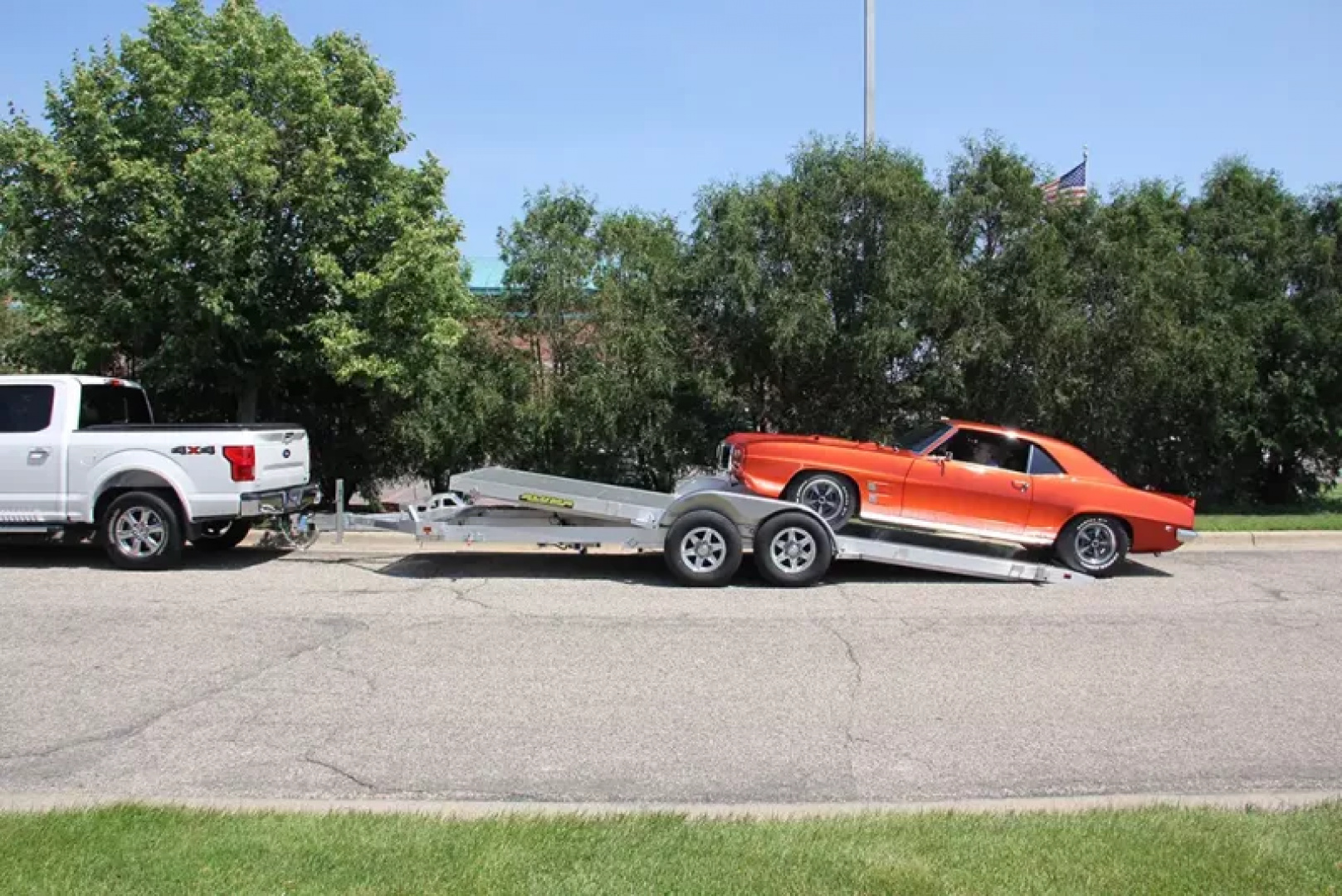 New 2026 Aluma 82x18' Tilt, Tandem Axle, Electric Brake, Front Rail, 14" Alum Wheels, Spare Tire