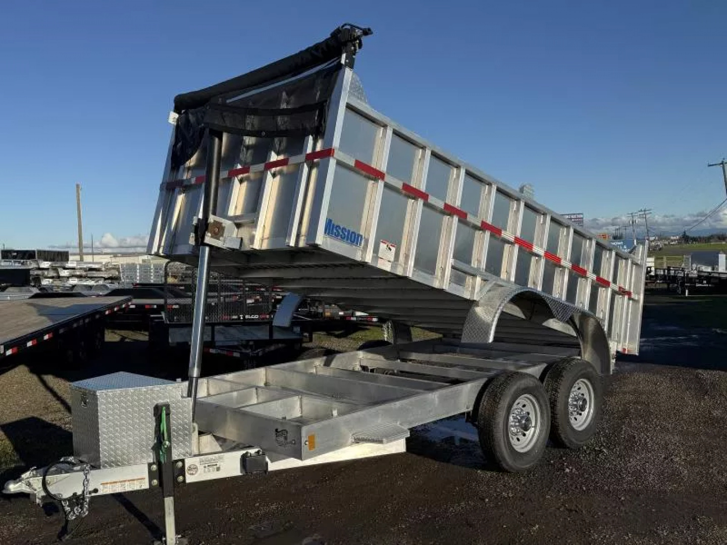 New 2026 Mission 7x14' Dump Trailer, 36" Tall Sides, 2-7k Leaf Spring Braked Axles, Spare Tire