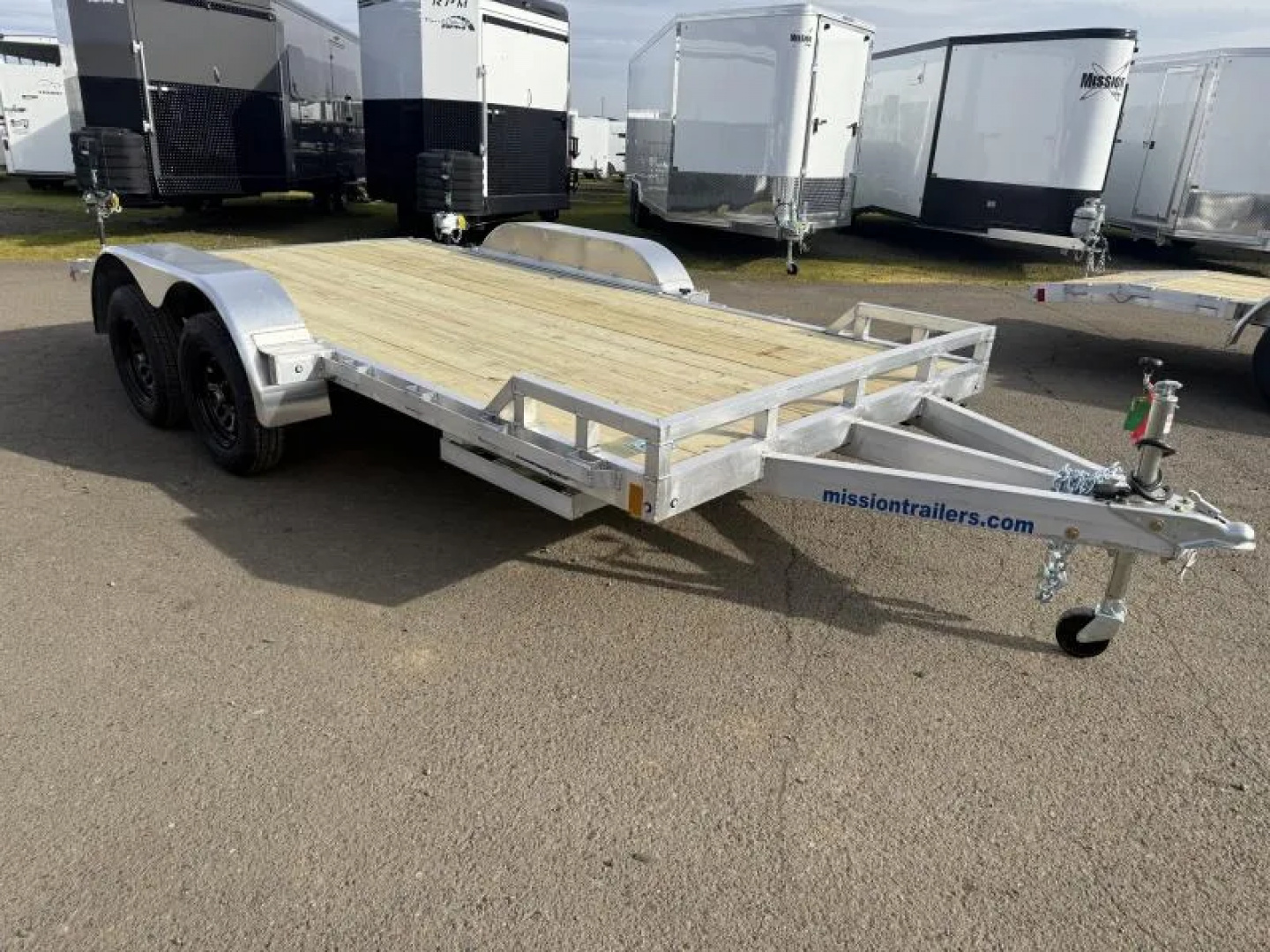 New 2026 Mission Open Car Hauler 6'4"x16'-Wood Deck-(4) Recessed D-Rings-2' Beavertail-6' Stowaway Aluminum Ramps, 3500# Leaf Spring Axles Car Hauler