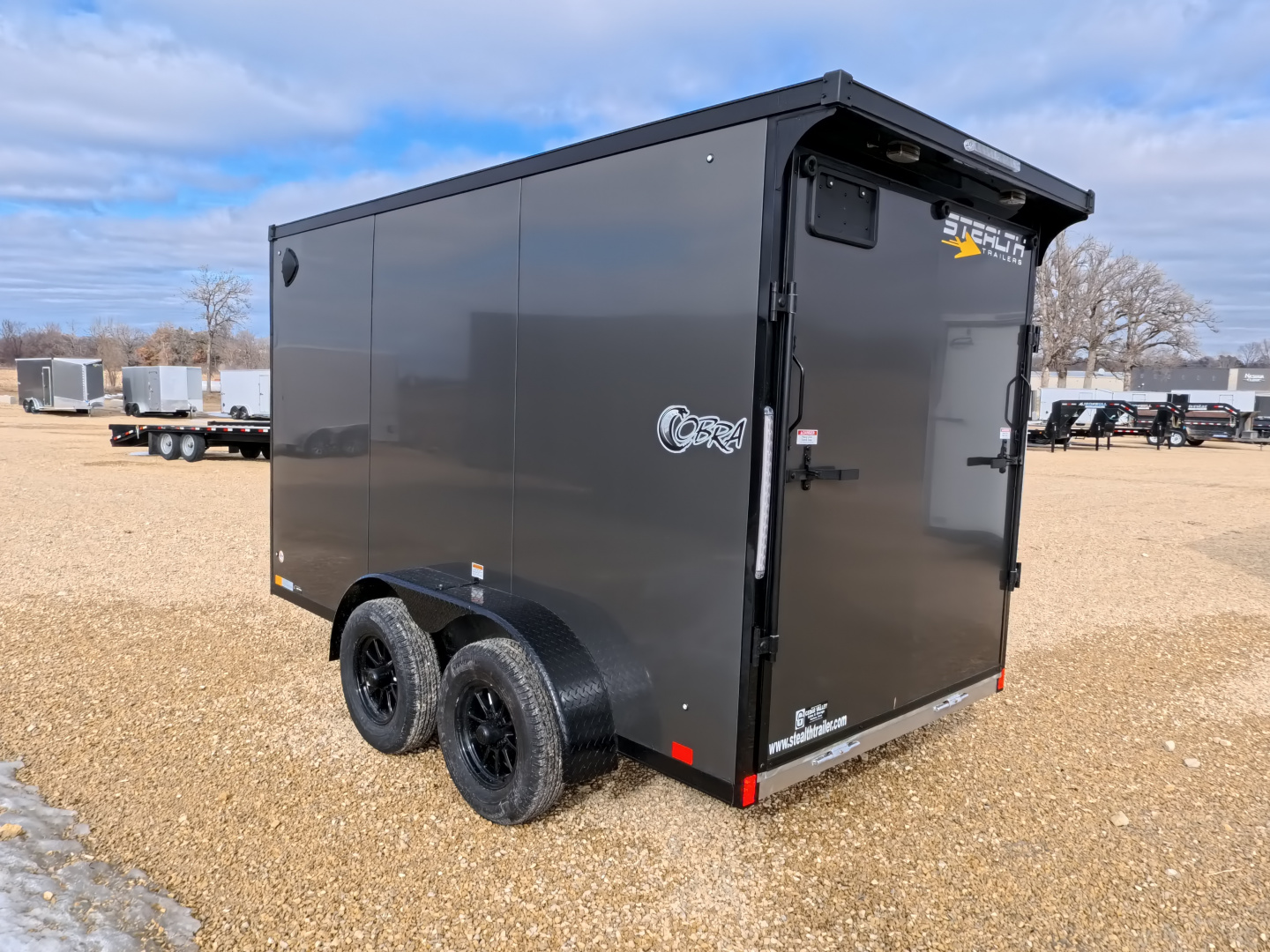 New 2026 Stealth Trailers 6 x 12 x 6.5 Cobra Cargo / Enclosed Trailer, 7k GVWR, Rear Flare with Load Lights, Charcoal with Blackout Pkg.