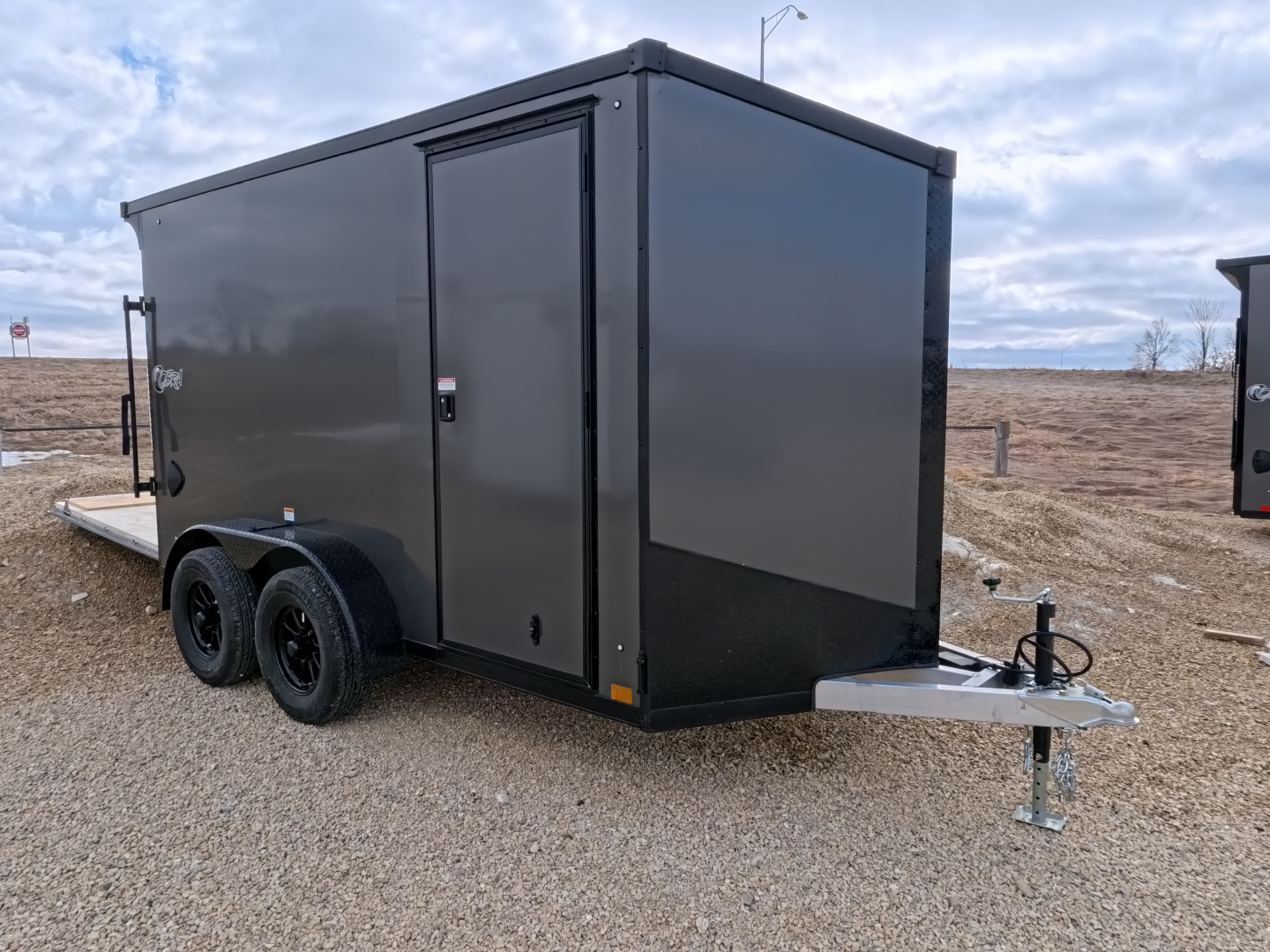 New 2026 Stealth Trailers 6 x 12 x 6.5 Cobra Cargo / Enclosed Trailer, 7k GVWR, Rear Flare with Load Lights, Charcoal with Blackout Pkg.