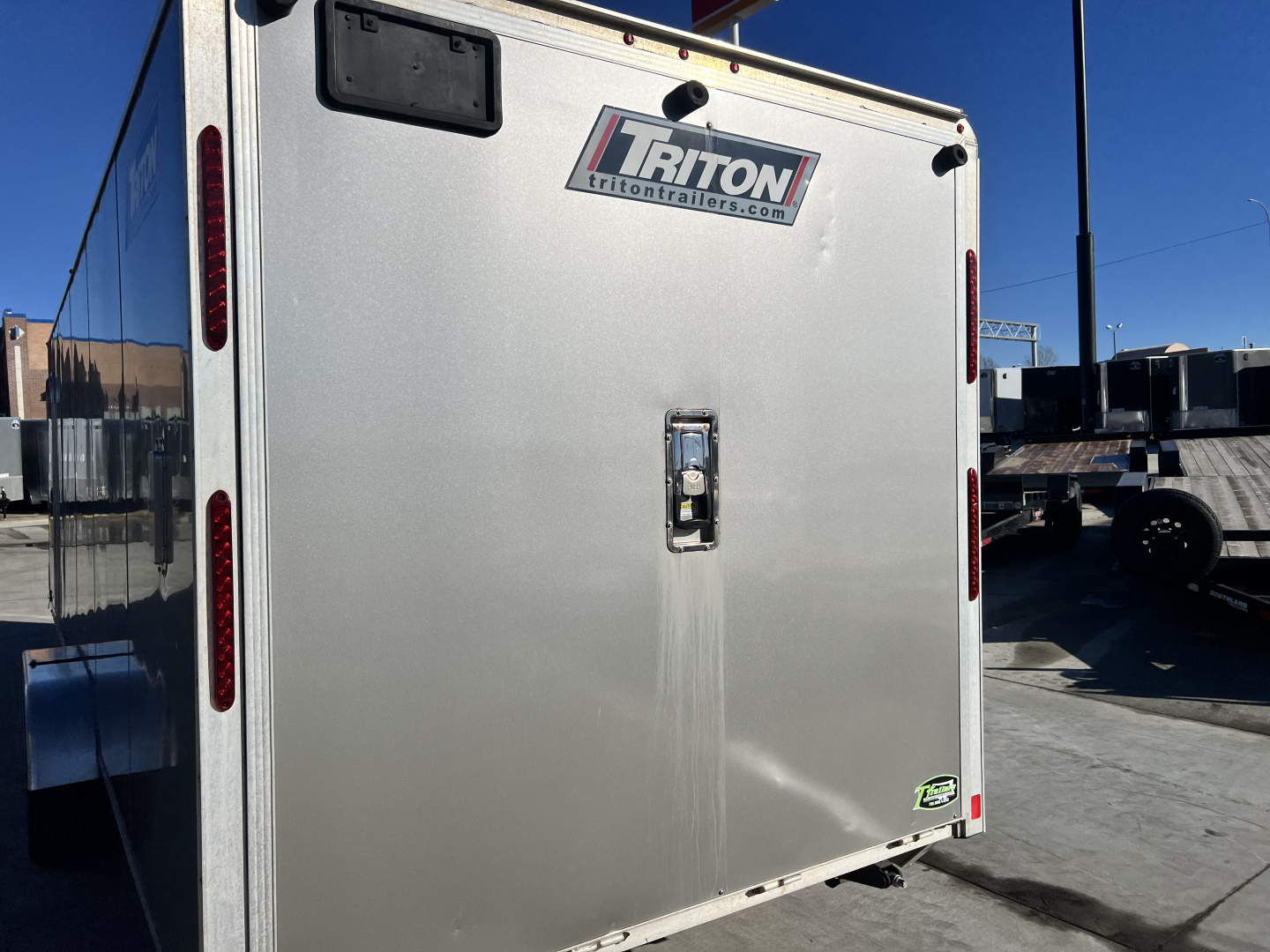 Used 2016 Triton 7x27 Aluminum Drive Out Front Enclosed Rear Ramp Snowmobile Cargo Trailer