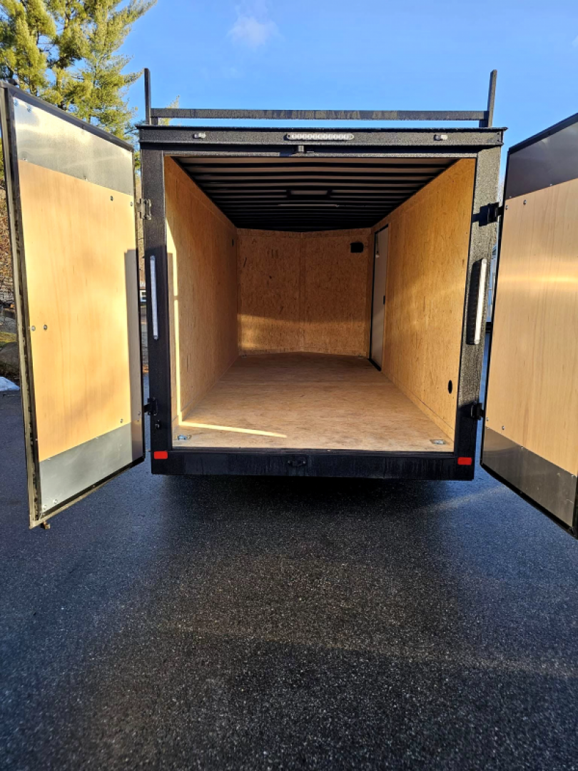 New 2025 7x16 contractor trailer with barn doors and ladder racks - Covered Wagon