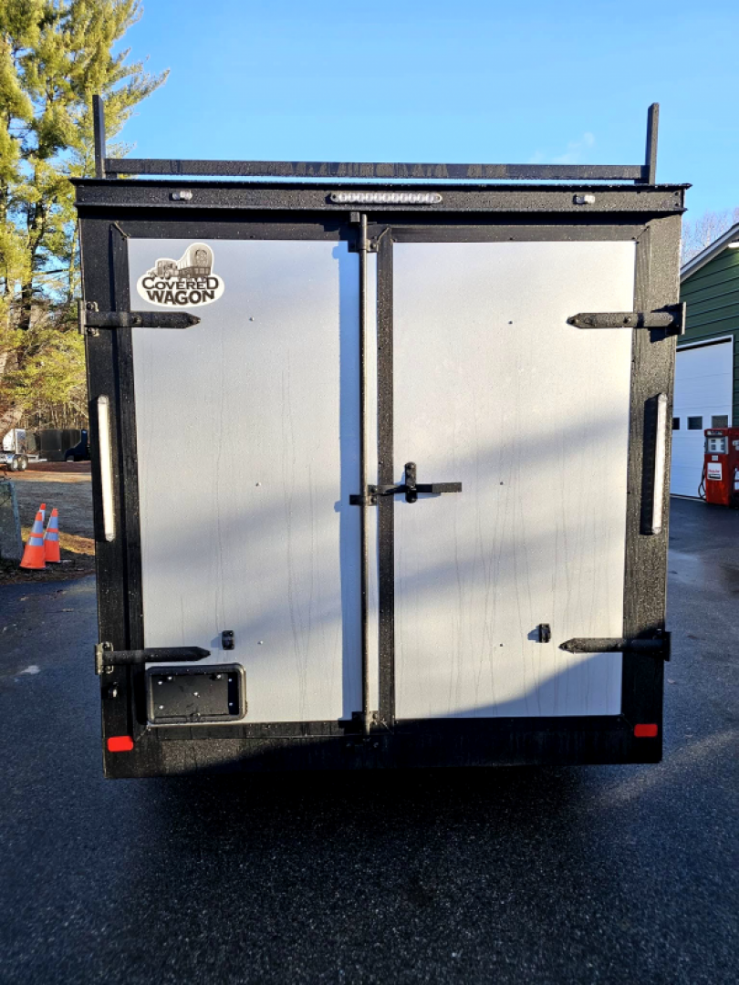 New 2025 7x16 contractor trailer with barn doors and ladder racks - Covered Wagon