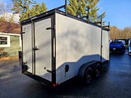 New 2025 7x16 contractor trailer with barn doors and ladder racks - Covered Wagon