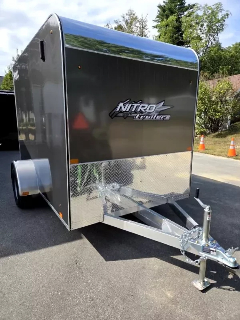 New 2026 6X10 ENCLOSED CARGO TRAILER FLAT FORNT WITH REAR RAMP TORSION AXLE - Nitro