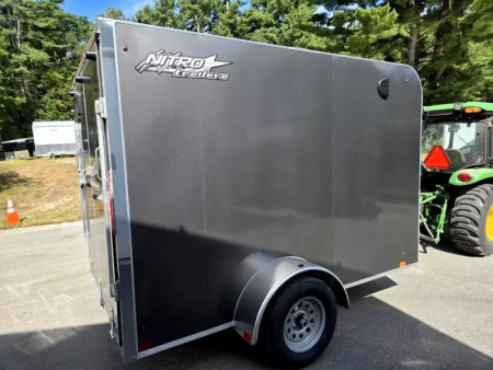 New 2026 6X10 ENCLOSED CARGO TRAILER FLAT FORNT WITH REAR RAMP TORSION AXLE - Nitro