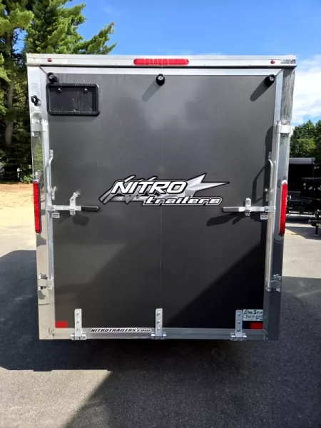 New 2026 6X10 ENCLOSED CARGO TRAILER FLAT FORNT WITH REAR RAMP TORSION AXLE - Nitro