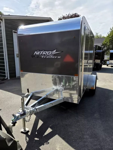 New 2026 6X10 ENCLOSED CARGO TRAILER FLAT FORNT WITH REAR RAMP TORSION AXLE - Nitro