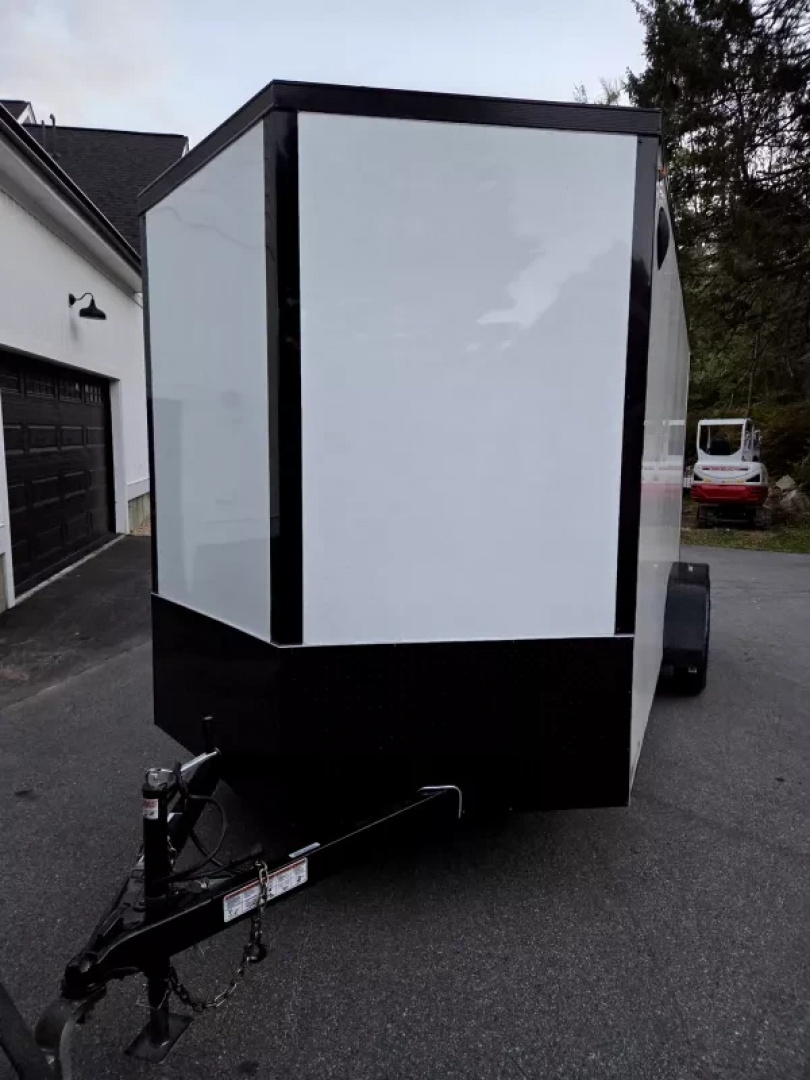 New 2026 7x16 extra height cargo trailer with black out package and torsion axles - Legend Trailers