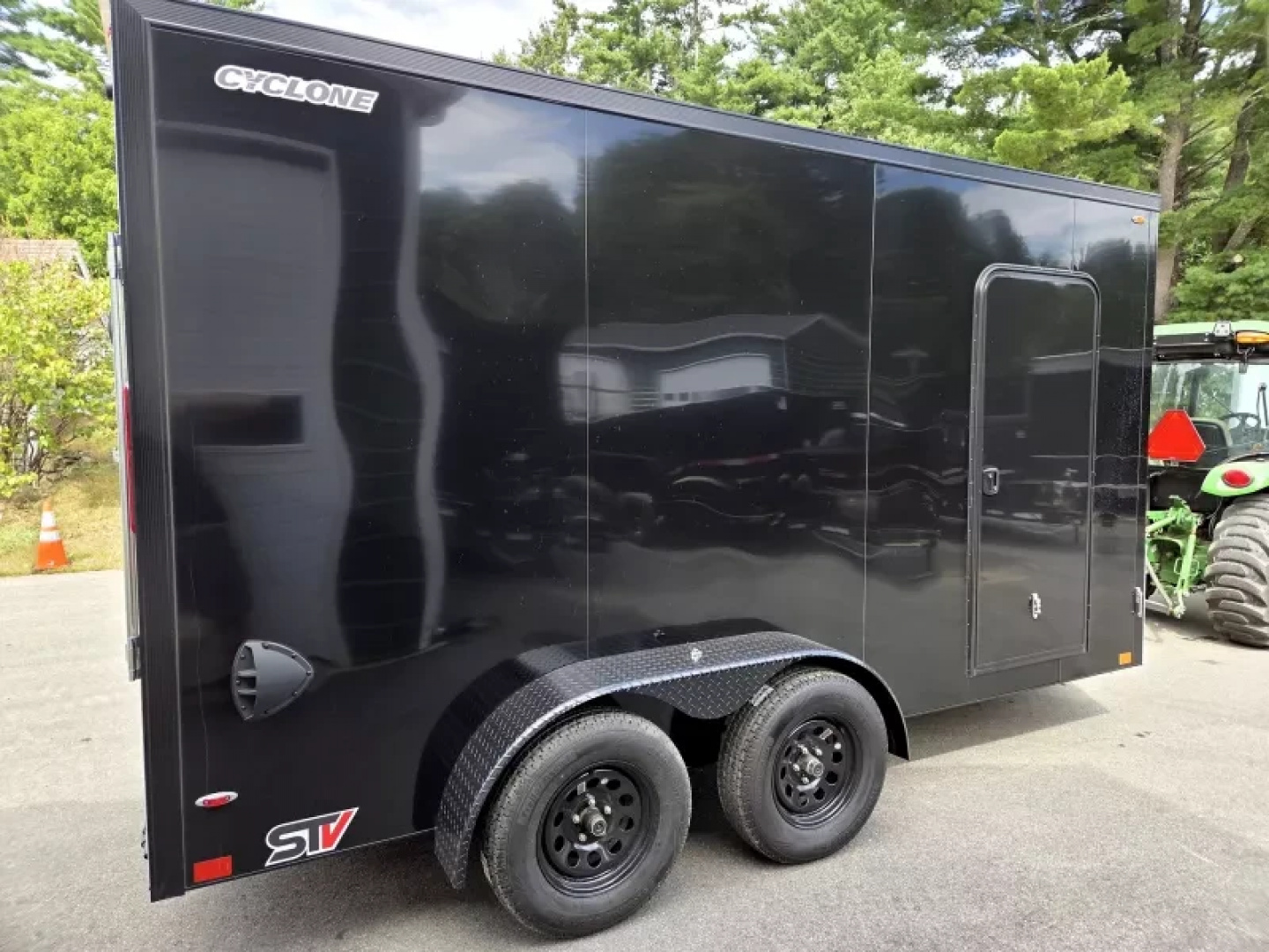 New 2026 7x16 extra height cargo trailer torsion axles with black out trim package and extra height - Legend Trailers