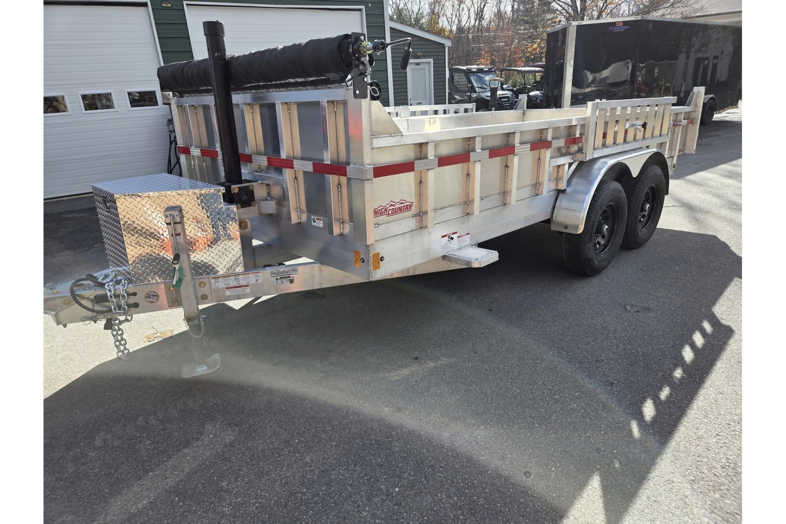 New 2026 7x16 14000lb gvwr dump trailer with ramps and tarp kit - High Country Trailers