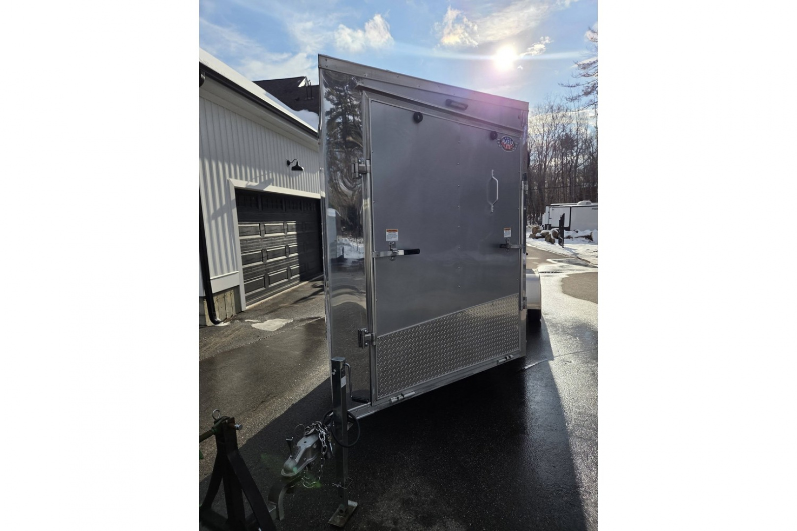 New 2023 7x20 aluminum snowmobile trailer 3 or 4 place left over wit extra height and upgrades - Rance Aluminum Trailers