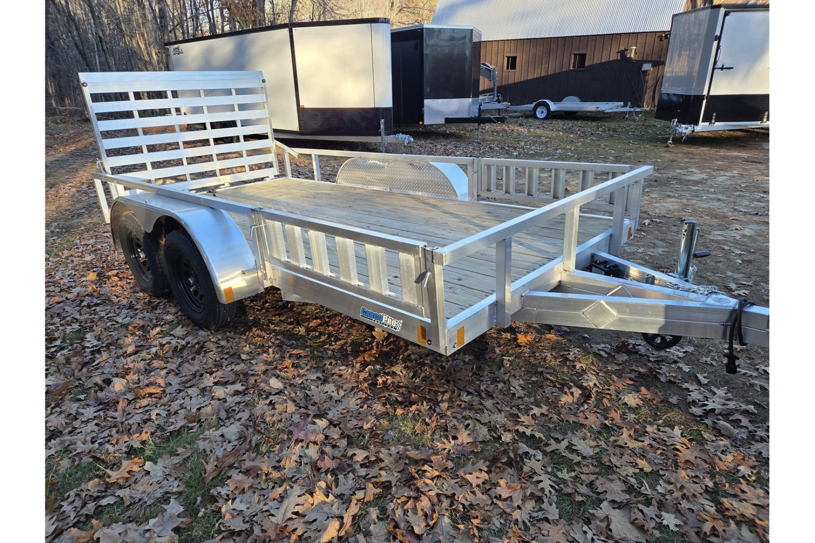 New 2026 6.5x14 aluminum utility trailer dual axle with atv ramp kit - High Country Trailers