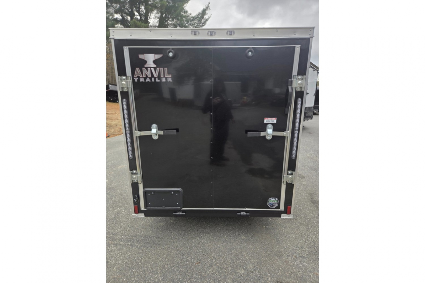 New 2026 5x8 Enclosed Cargo Trailer with side door and rear ramp Black - Anvil Trailers