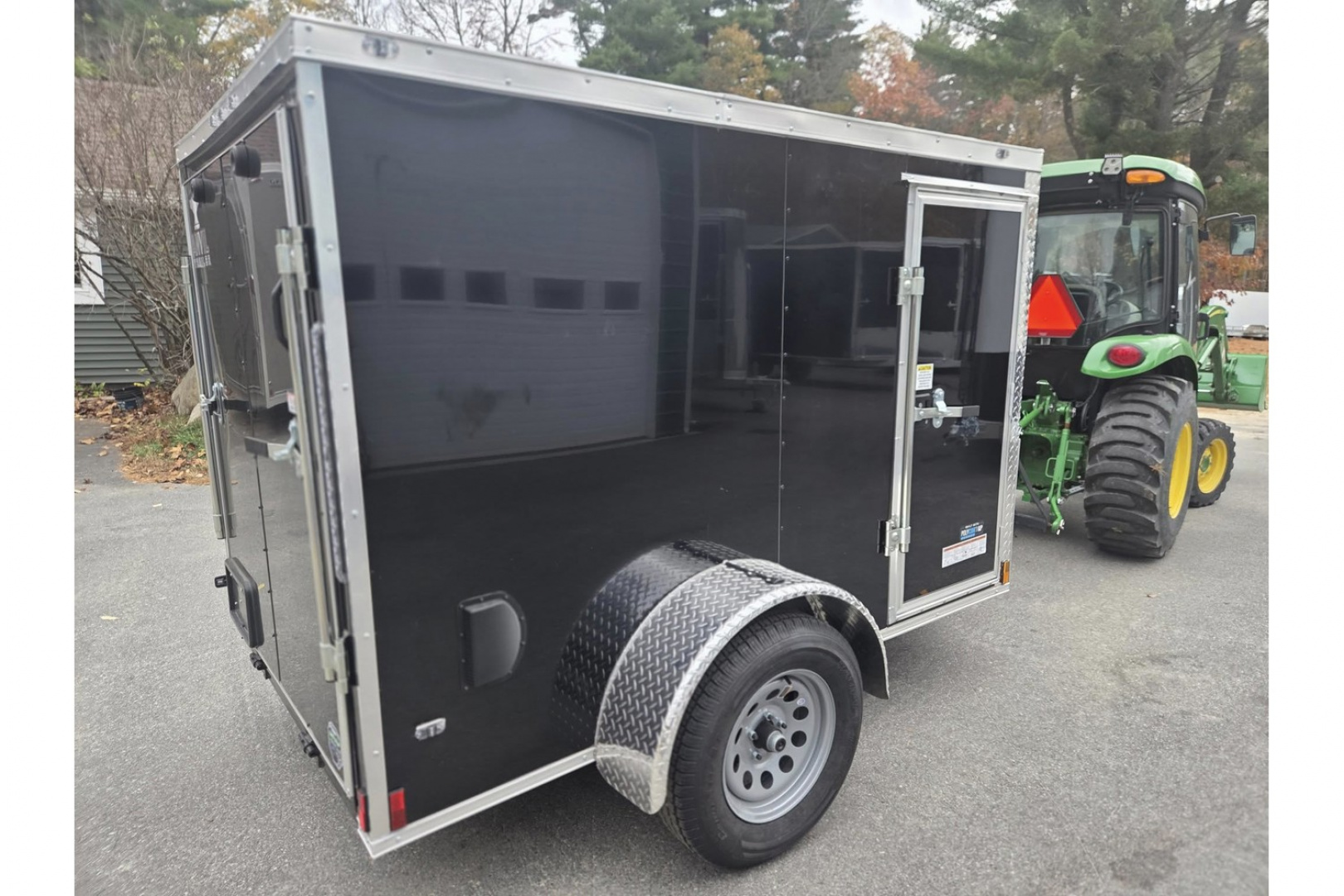 New 2026 5x8 Enclosed Cargo Trailer with side door and rear ramp Black - Anvil Trailers
