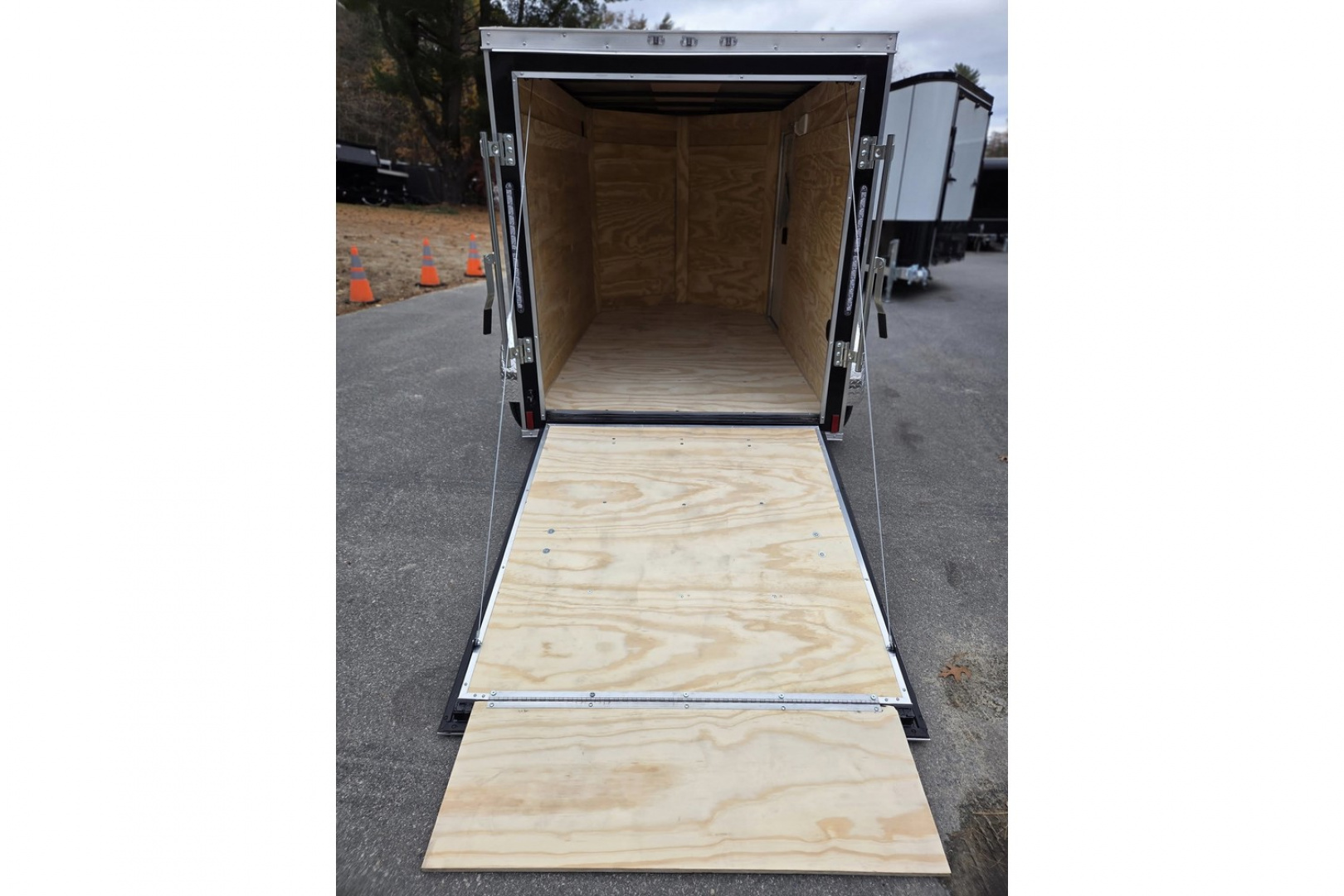 New 2026 5x8 Enclosed Cargo Trailer with side door and rear ramp Black - Anvil Trailers