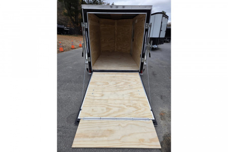 New 2026 5x8 Enclosed Cargo Trailer with side door and rear ramp Black - Anvil Trailers