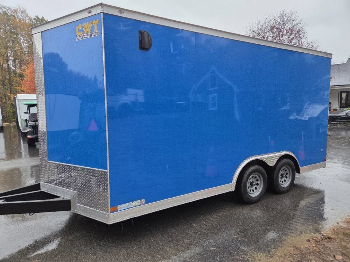 New 2026 8.5x16 extra height enclosed cargo trailer with wall e trac and poly core siding rear ramp door - Covered Wagon