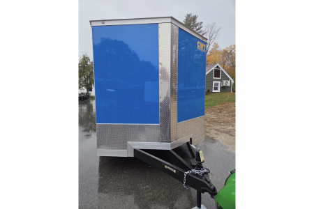 New 2026 8.5x16 extra height enclosed cargo trailer with wall e trac and poly core siding rear ramp door - Covered Wagon