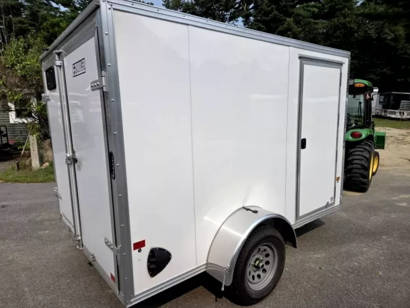 Used 2025 6.5x10 Aluminum enclosed cargo trailer with barn doors - High Country Trailers