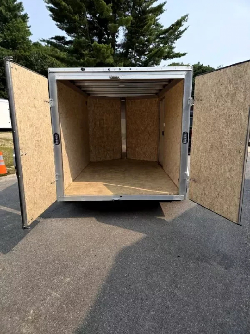 Used 2025 6.5x10 Aluminum enclosed cargo trailer with barn doors - High Country Trailers