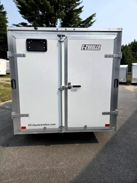 Used 2025 6.5x10 Aluminum enclosed cargo trailer with barn doors - High Country Trailers