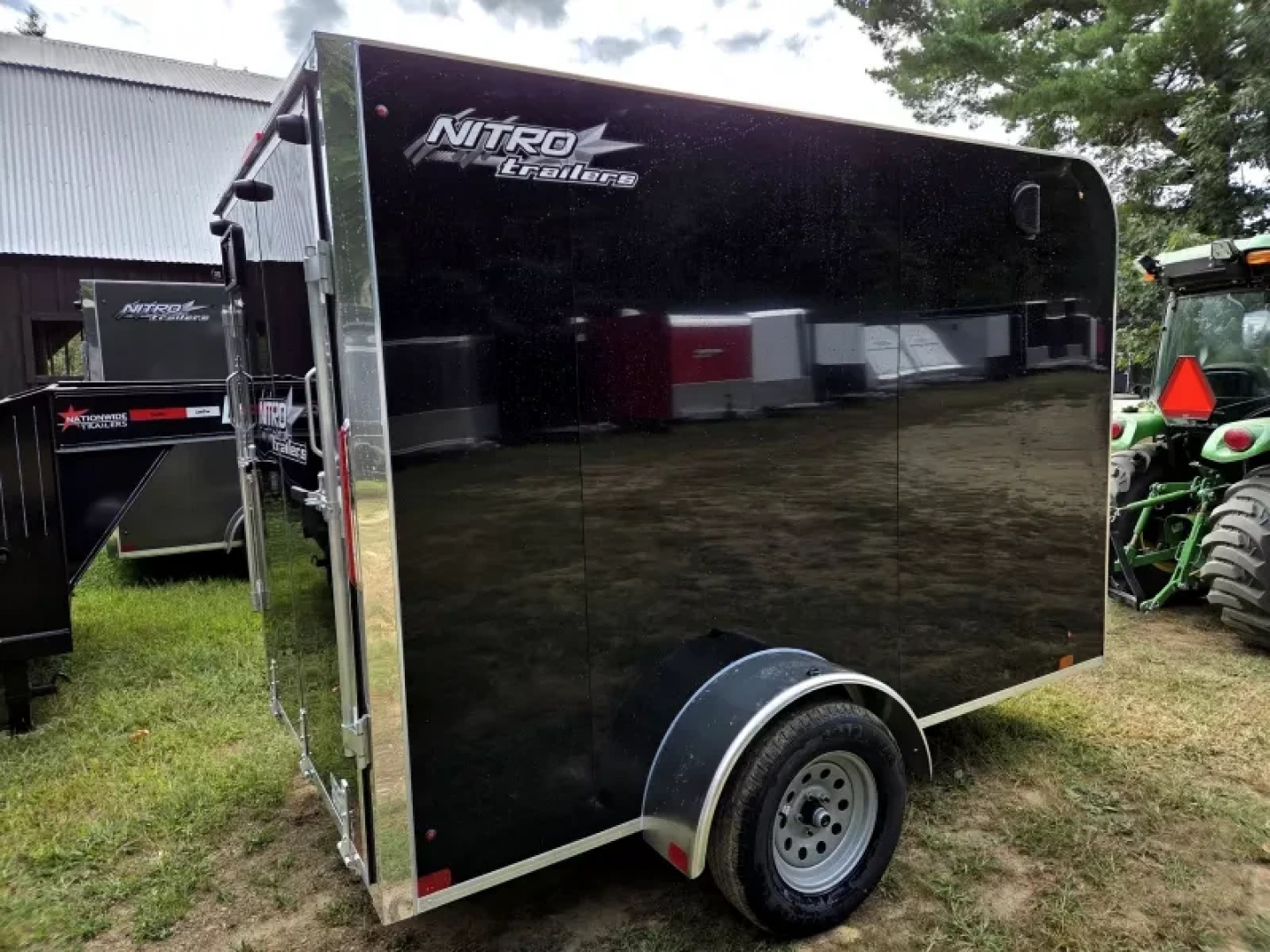 New 2026 2026 Nitro 6x10 enclosed cargo trailer flat front with rear ramp & side door torsion axle - Nitro