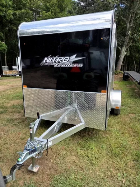 New 2026 2026 Nitro 6x10 enclosed cargo trailer flat front with rear ramp & side door torsion axle - Nitro