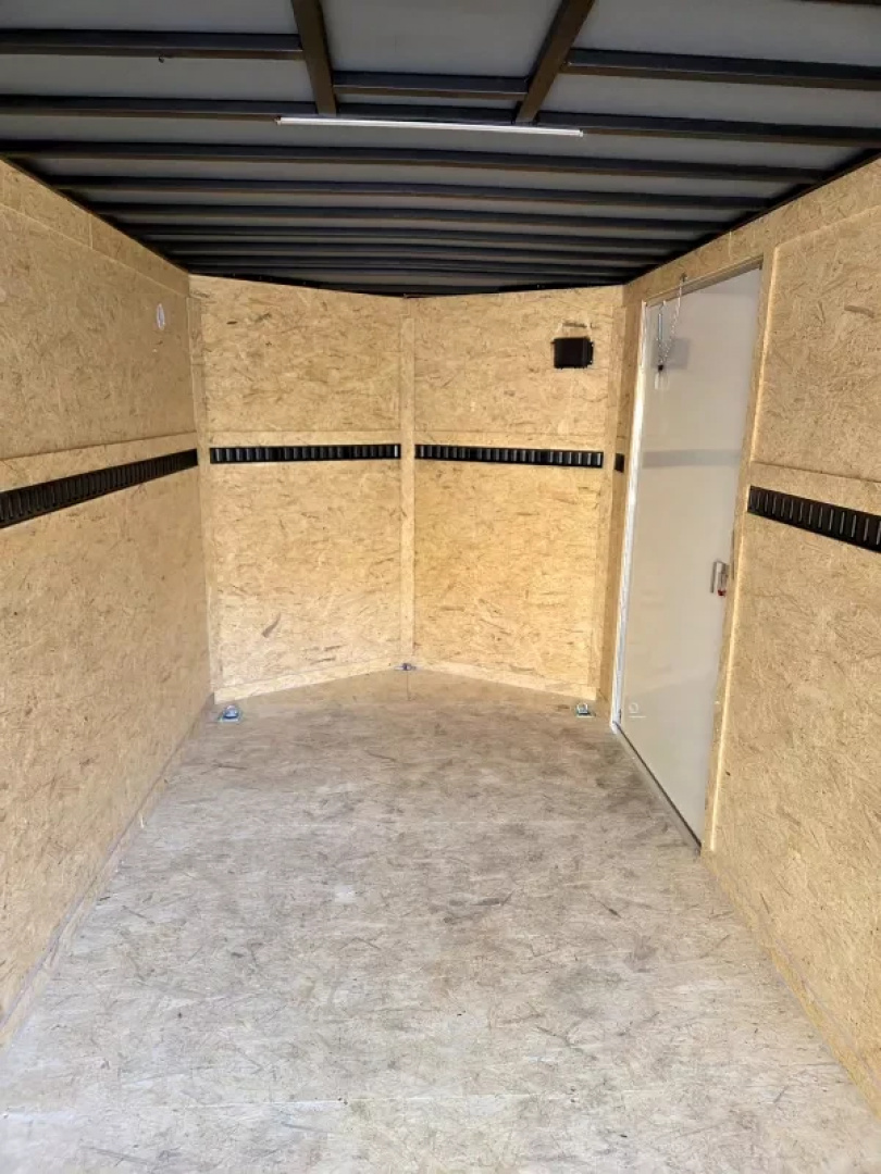 New 2026 7X17 CARGO TRAILER WITH E TRAC EXTRA HEGHT - Covered Wagon